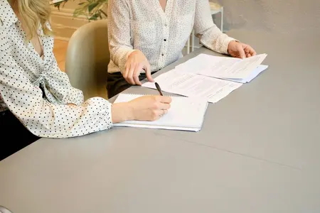 People reviewing financial documents together